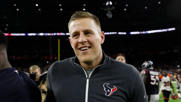 jj-watt-gives-jersey-to-kid.jpg